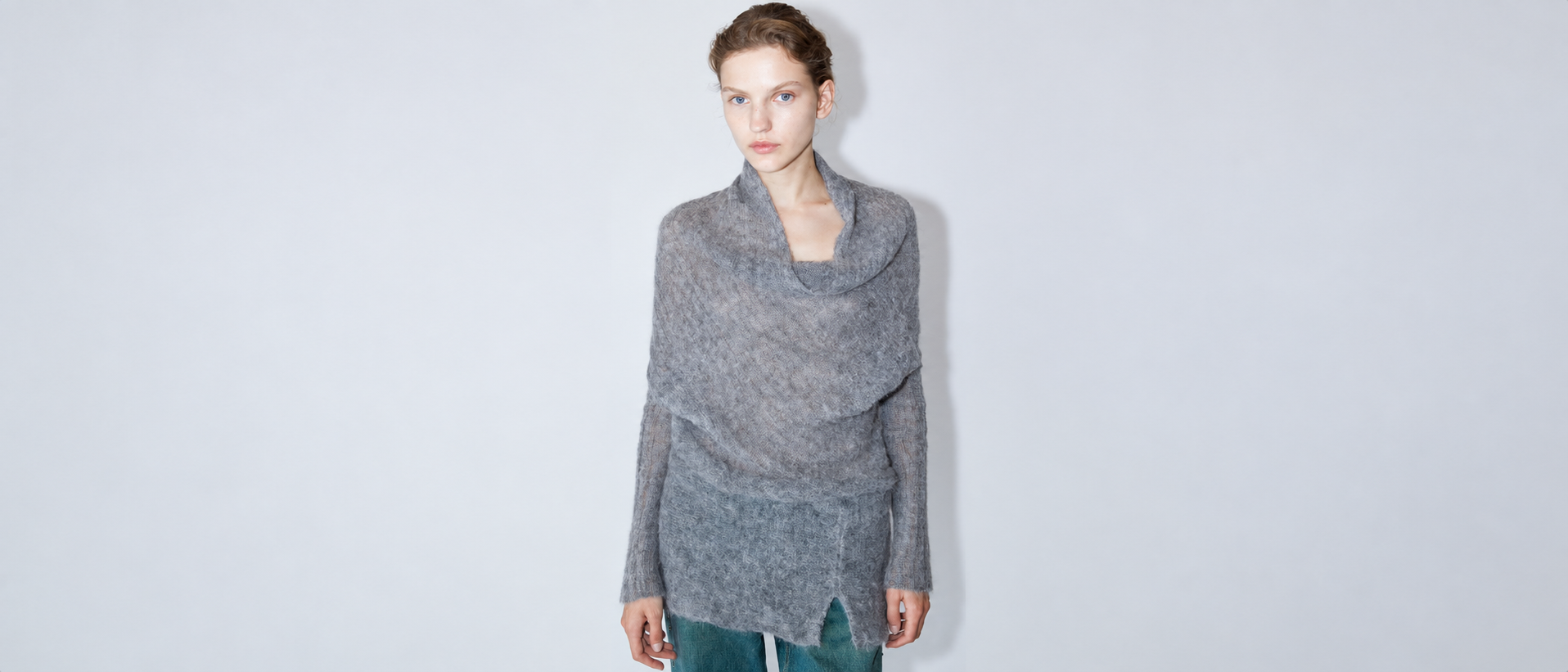 Modern womenswear styled in a minimal editorial setting